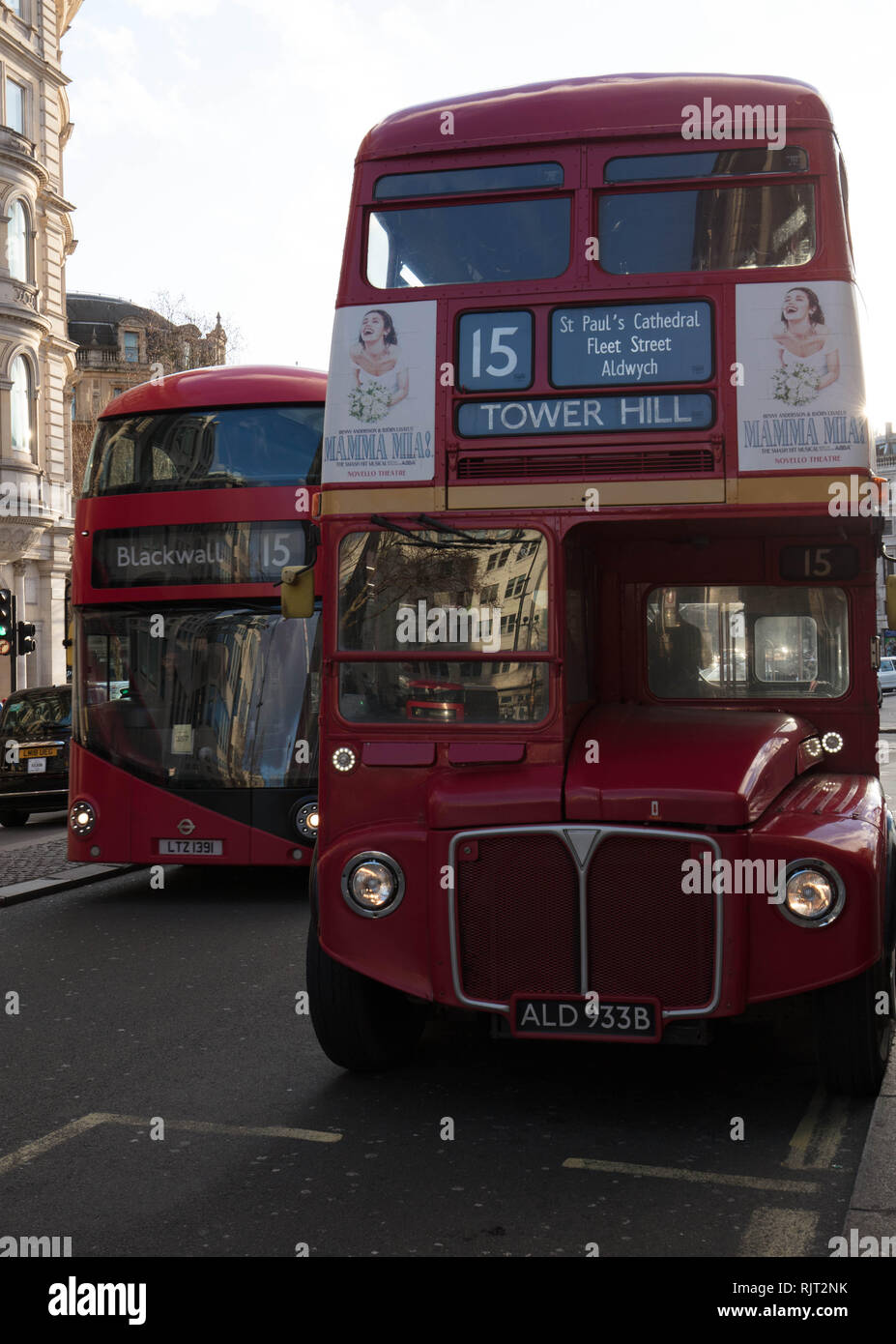 London, UK. 7th February 2019. Heritage Bus of Route 15, here next to its modern number, will stop running as from the 2nd March 2019, after many years of service. Credit: Joe Kuis / Alamy Live News Stock Photo