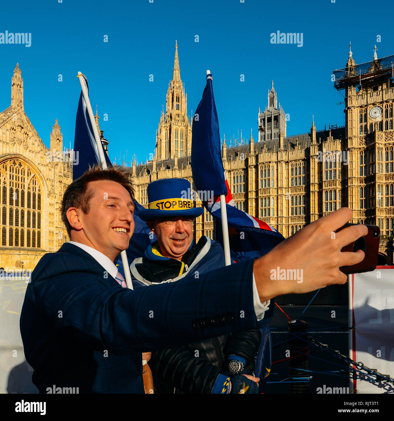 London, UK - Feb 7, 2019: Man takes a selfie with Steve Bray, founder of Sodem (Stand of Defiance European Movement), famous anti-Brexit protester, outside the Houses of Parliament, London Credit: Alexandre Rotenberg/Alamy Live News Stock Photo