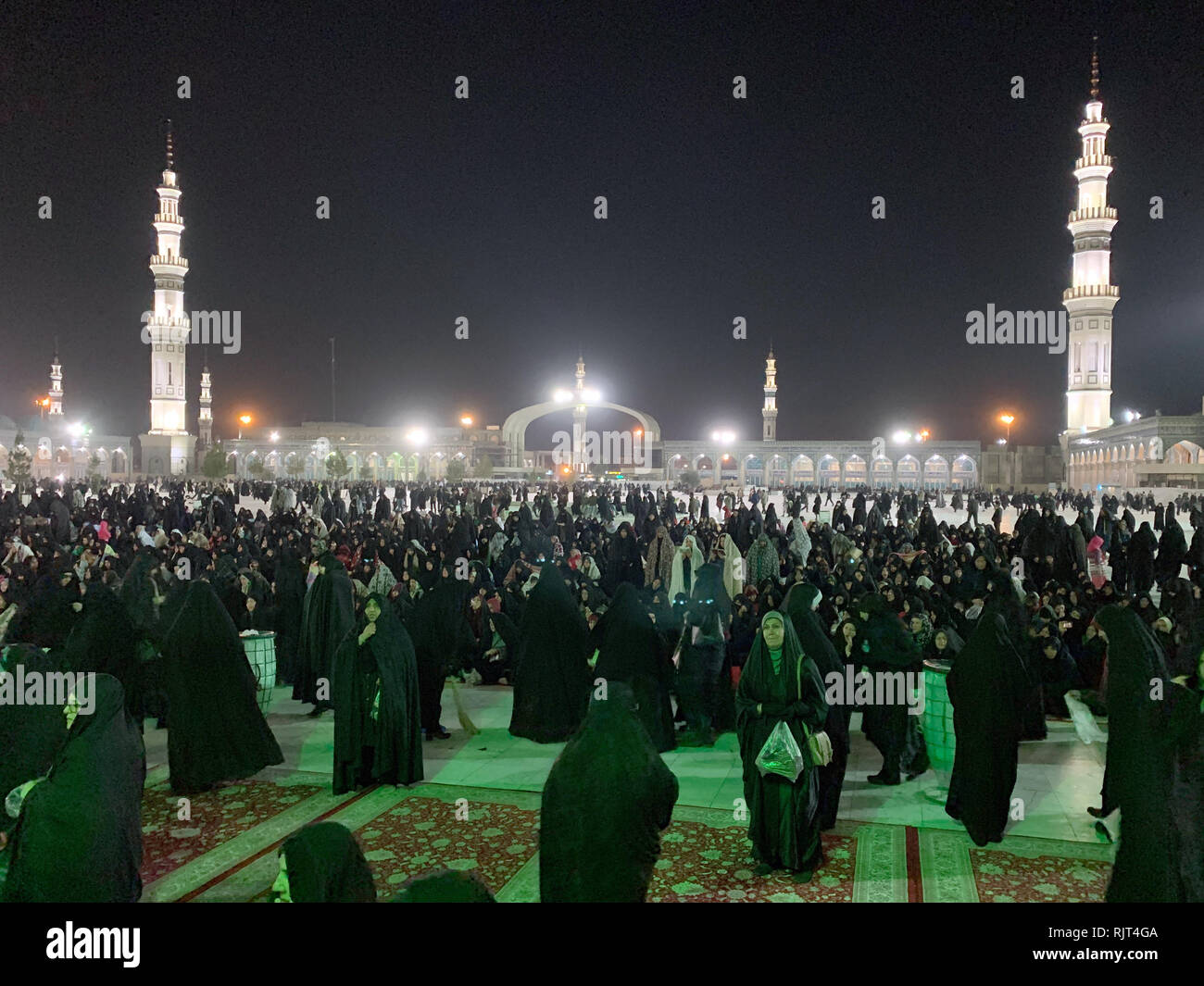 Ghom, Iran. 01st Jan, 2019. Iranian Muslims populate the Jamkaran Mosque in the evening. In the Jamkaran Mosque all wishes of the faithful are to be fulfilled. They can write down their wishes and throw them into a box. Through metaphysical channels, their wishes are then to be fulfilled. Especially seriously ill people in Iran see Jamkaran as their last hope for recovery. (to dpa 'Much shadow, little light - Iran's Islamic revolution turns 40' from 08.02.2019) Credit: Farshid Motahari/dpa/Alamy Live News Stock Photo