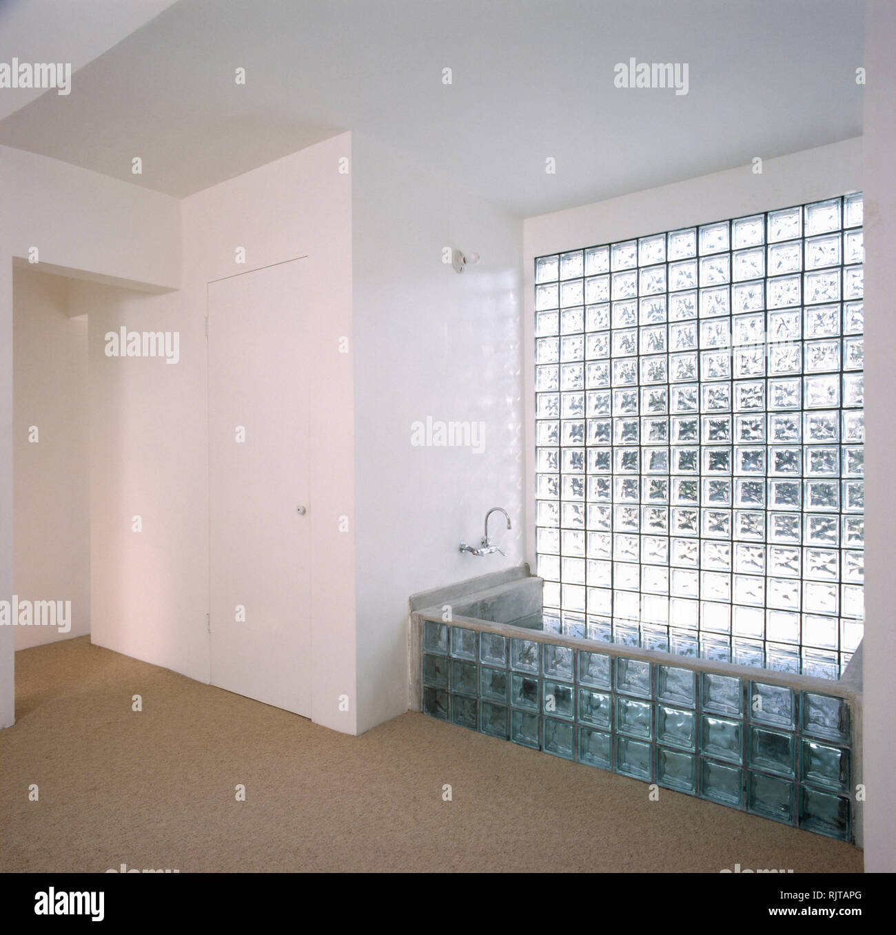 Eighties bathroom with glass brick bath and wall Stock Photo Alamy