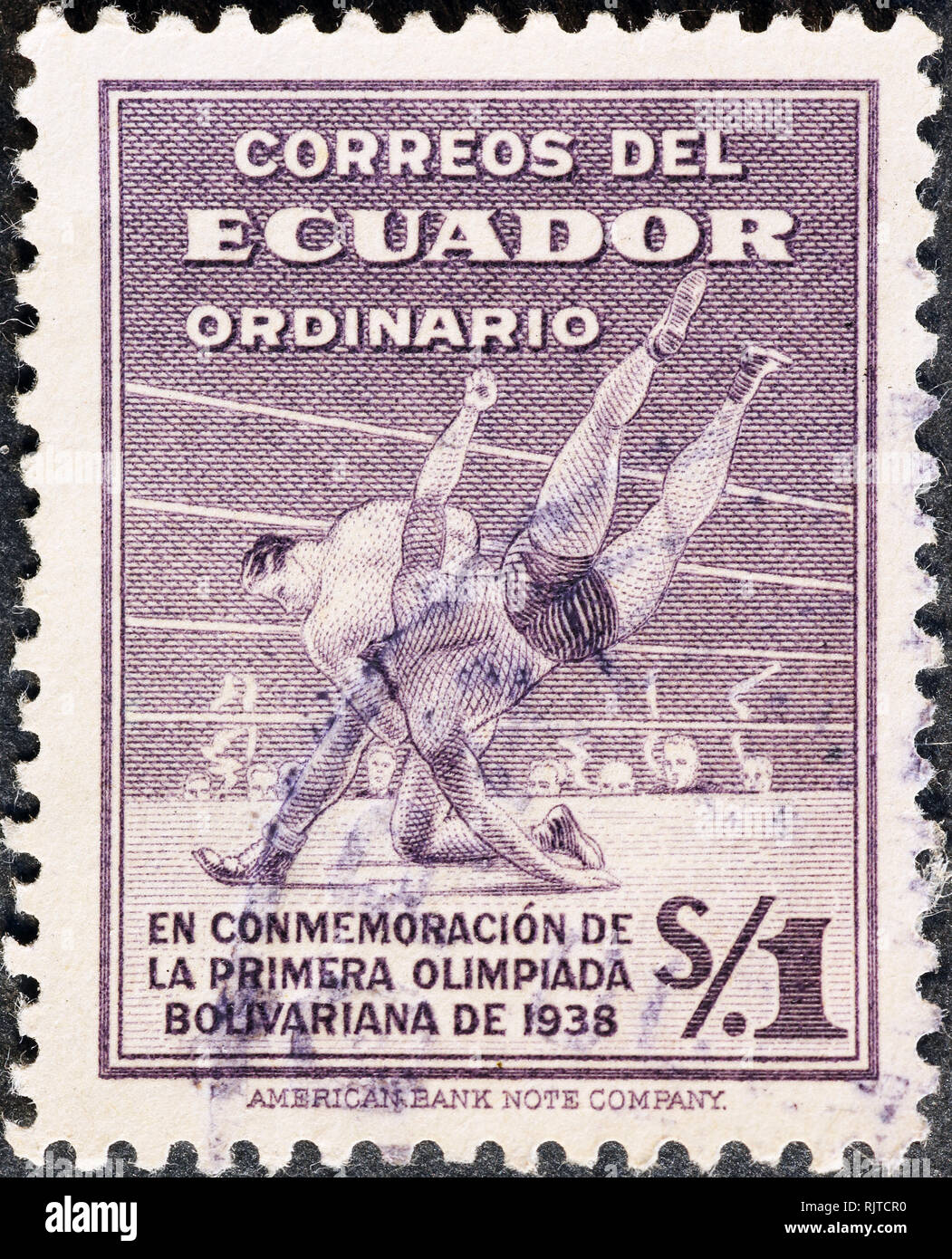 Wrestlers on vintage postage stamp of Ecuador Stock Photo