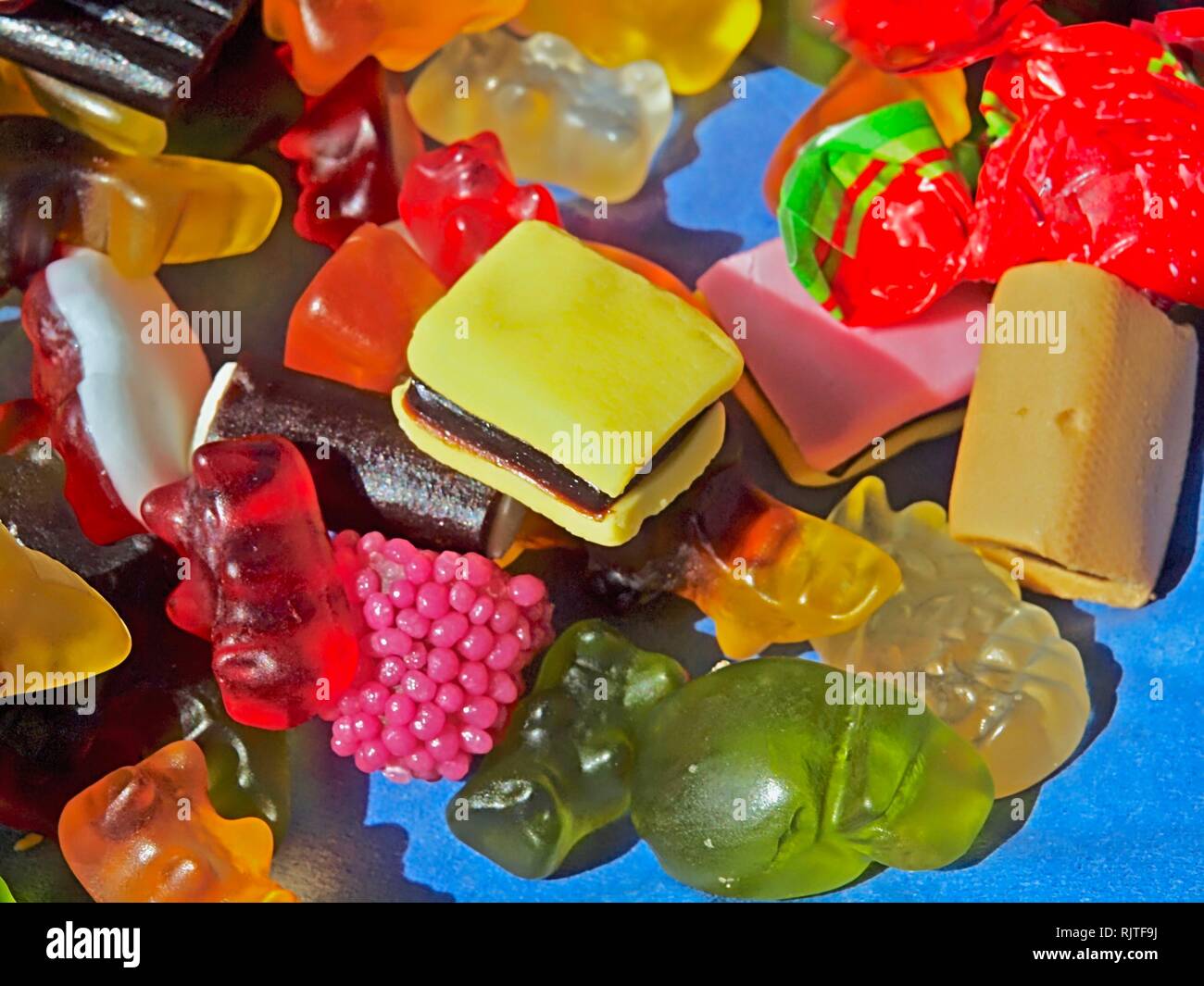Mix of colorful licorice and wine gums Stock Photo Alamy