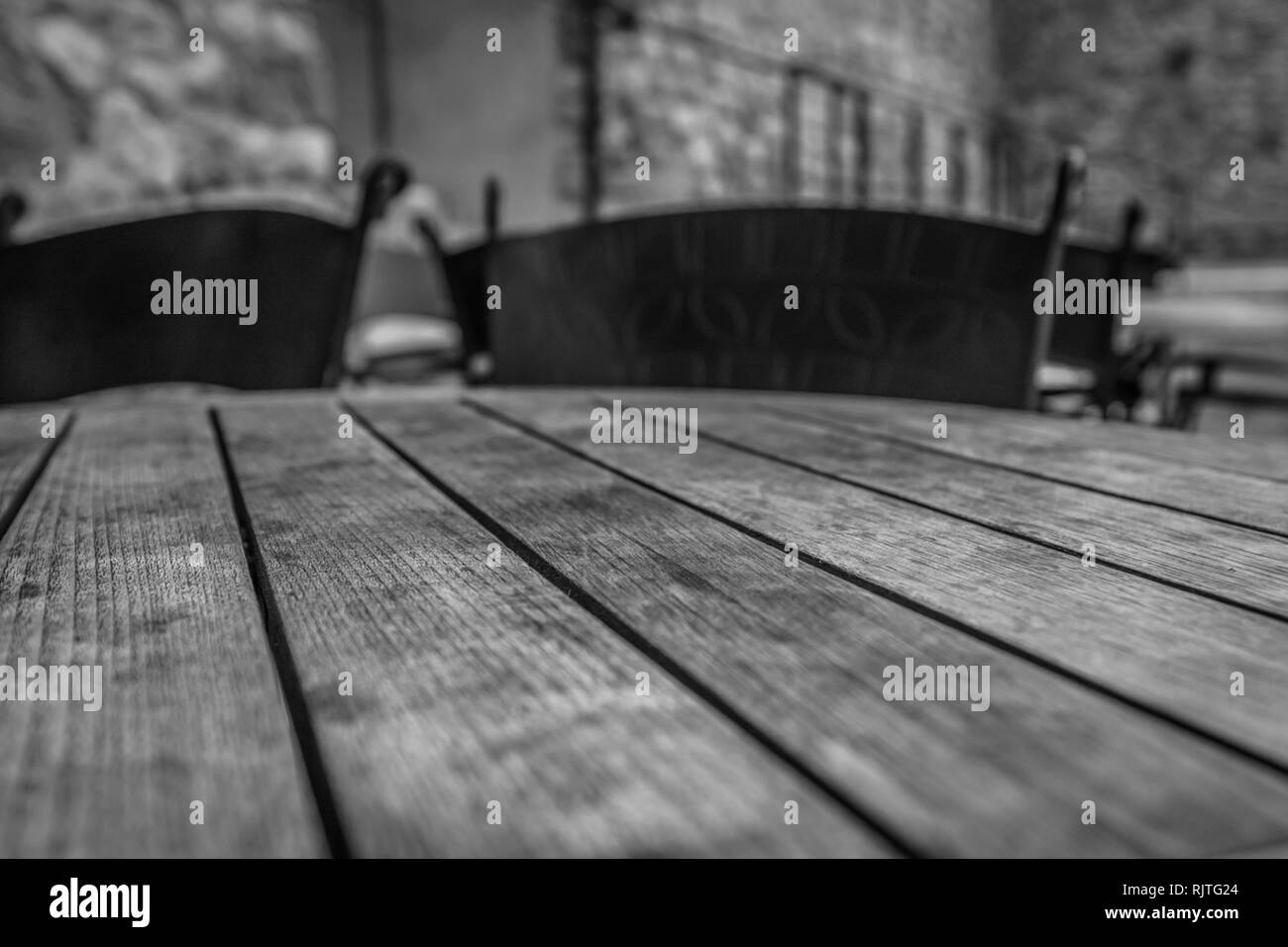 Wooden table at the coffee restaurant. Stock Photo