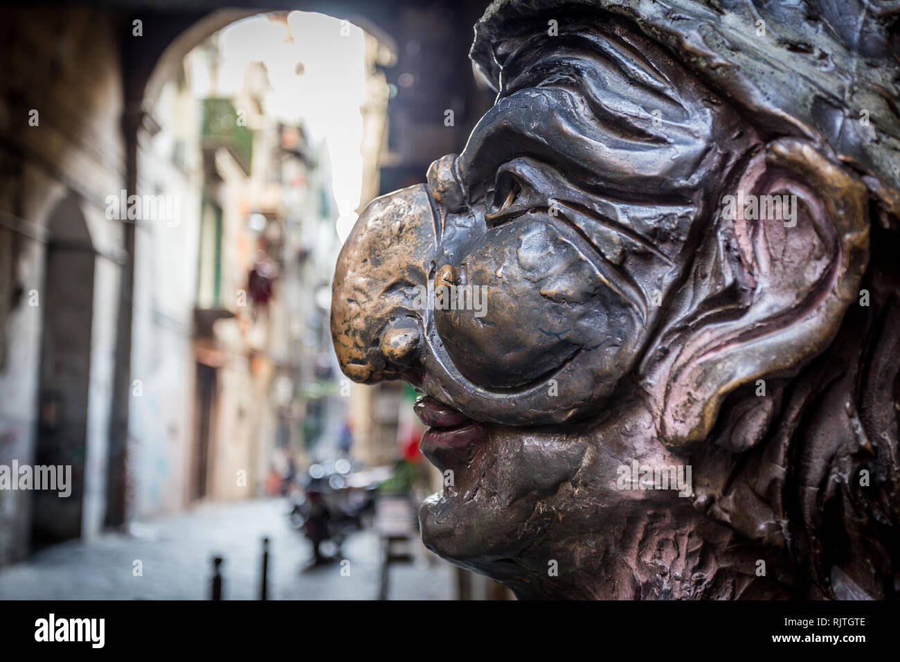 Traditional mask with face of Pulcinella in 'Spaccanapoli Streets' in the old town of Naples, Italy Stock Photo