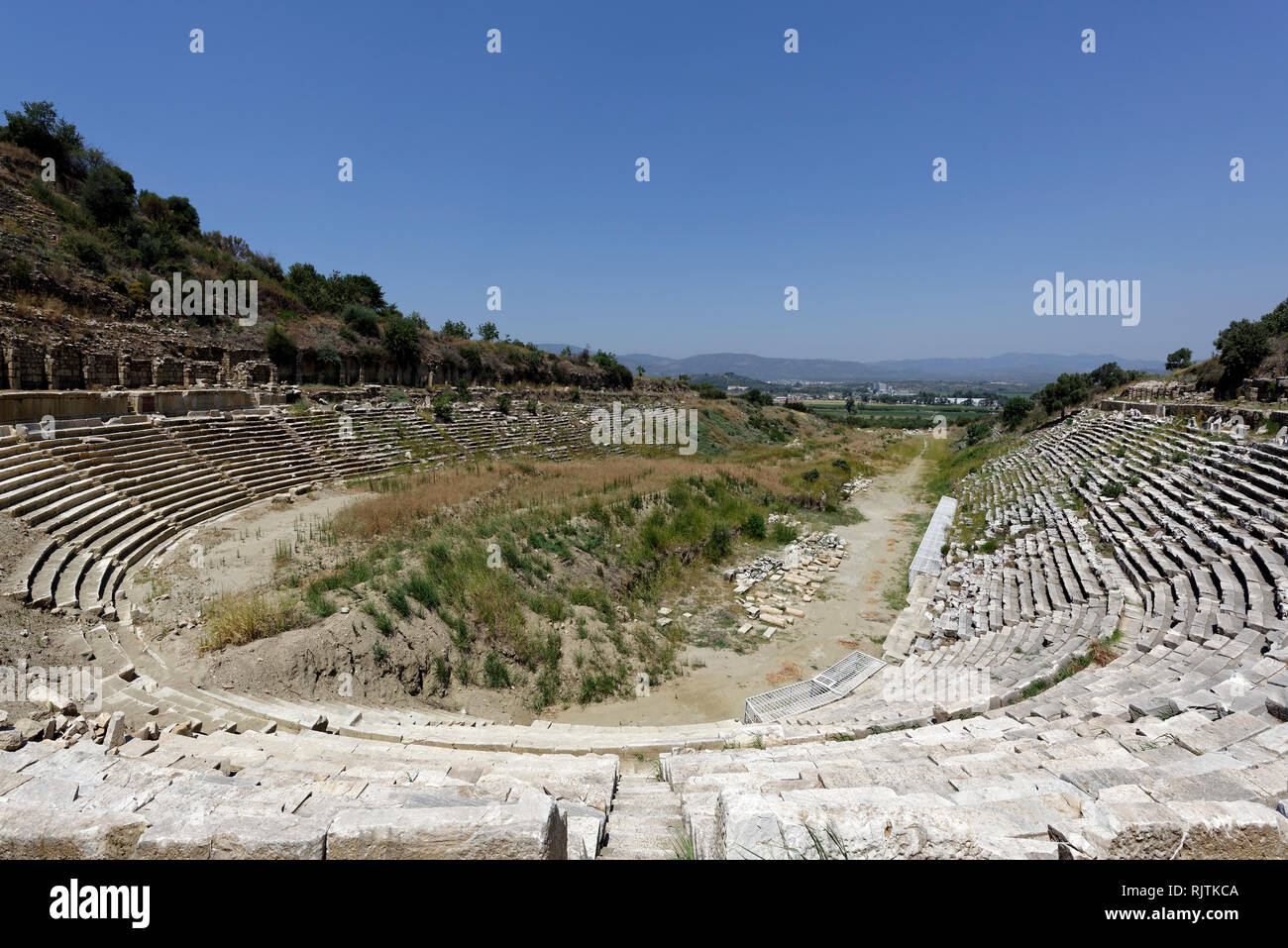 View of the large ancient stadium, Magnesia on the Meander, Tekin, Ionia, Turkey. The Stadium had the capacity to seat over 30,000 spectators and is o Stock Photo