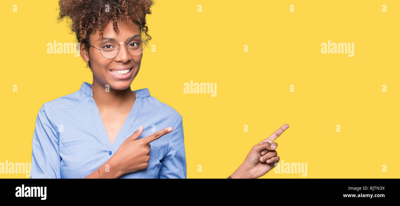 Beautiful young african american business woman over isolated ...
