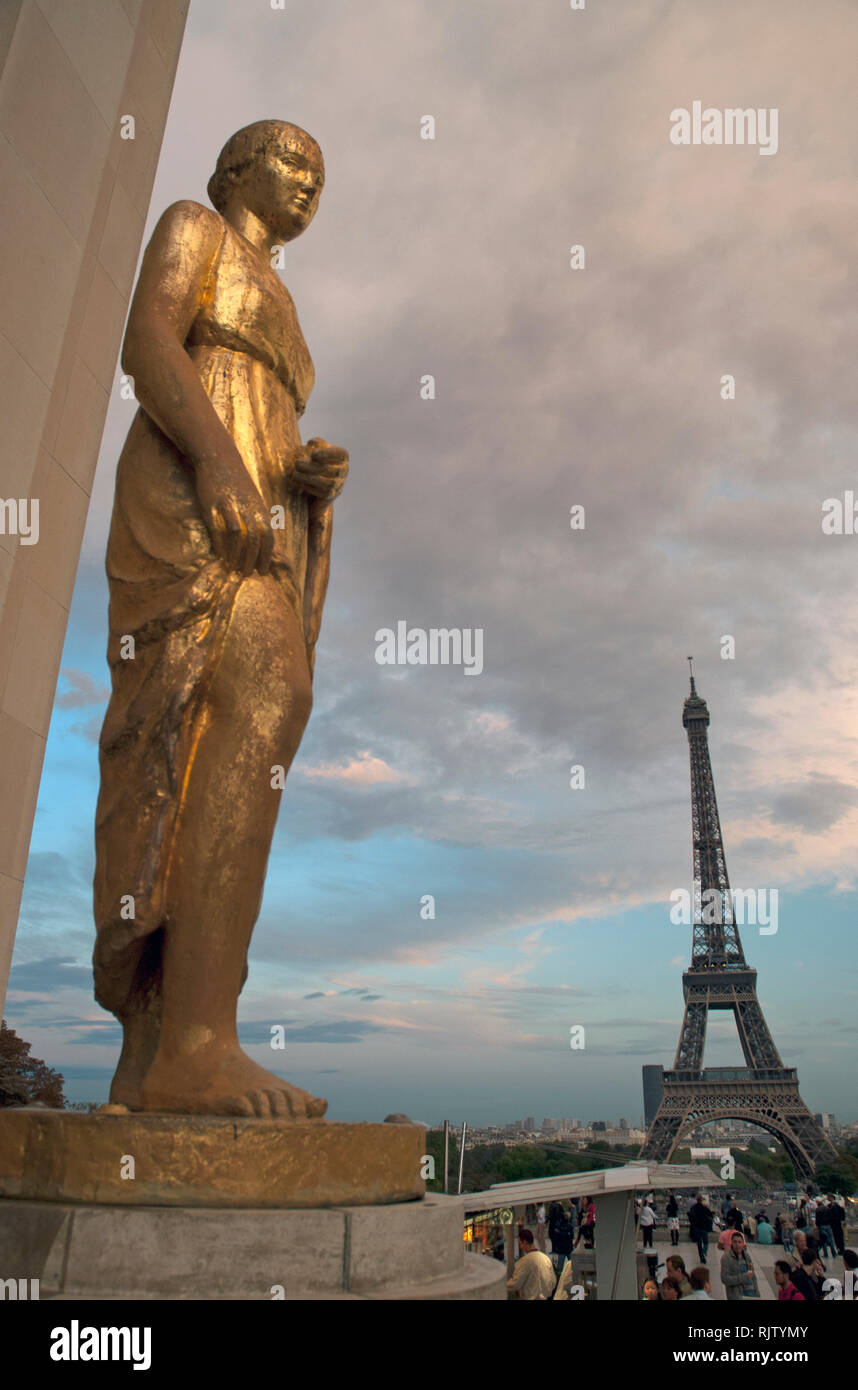 The Eiffel Tower viewed from Place du Trocadero with statues at the Palais de Chaillot, Paris, France Stock Photo