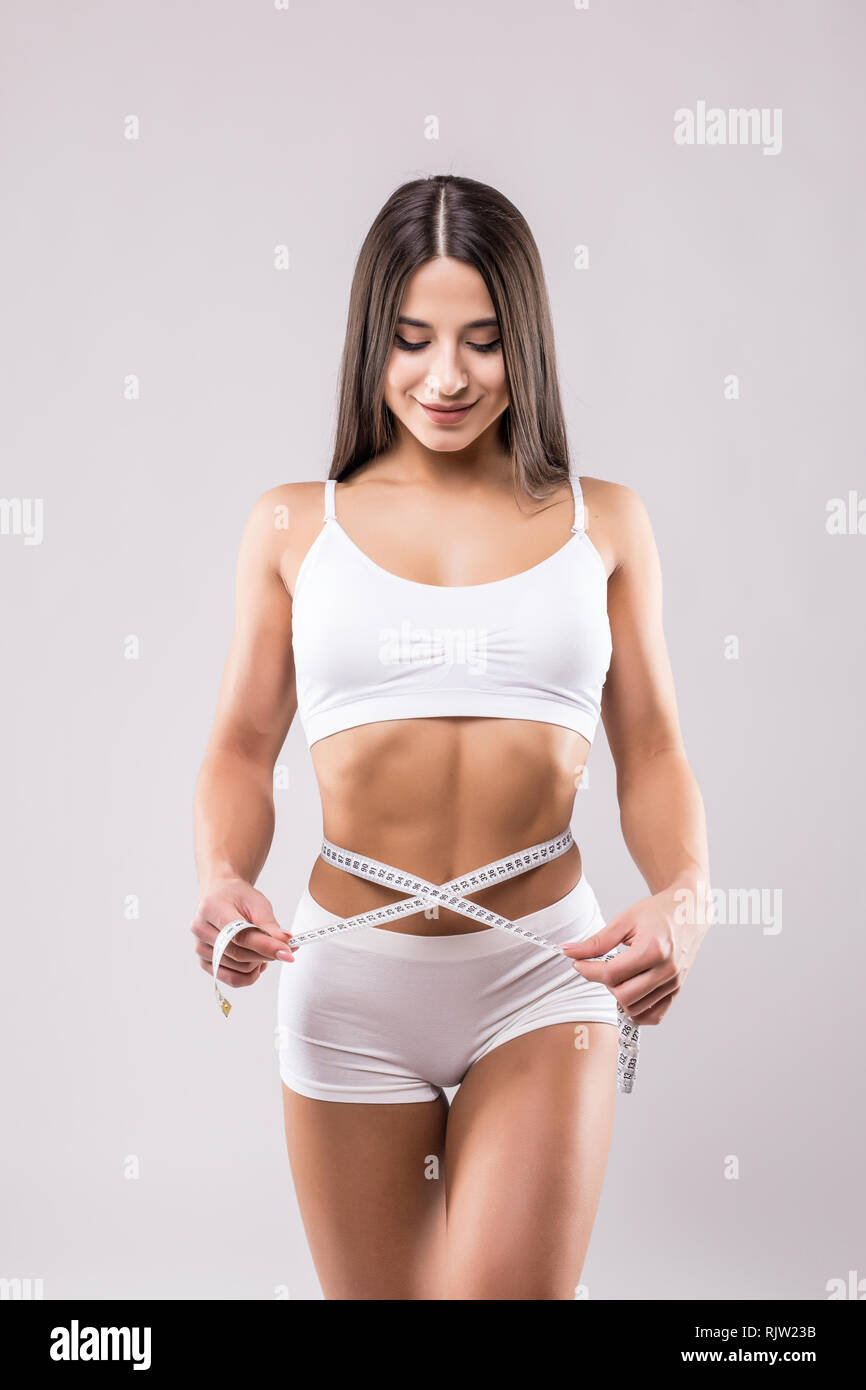 Close Up Shot Woman With Slim Body Measuring Torso Stock Photo - Download  Image Now - Dieting, Women, One Woman Only - iStock