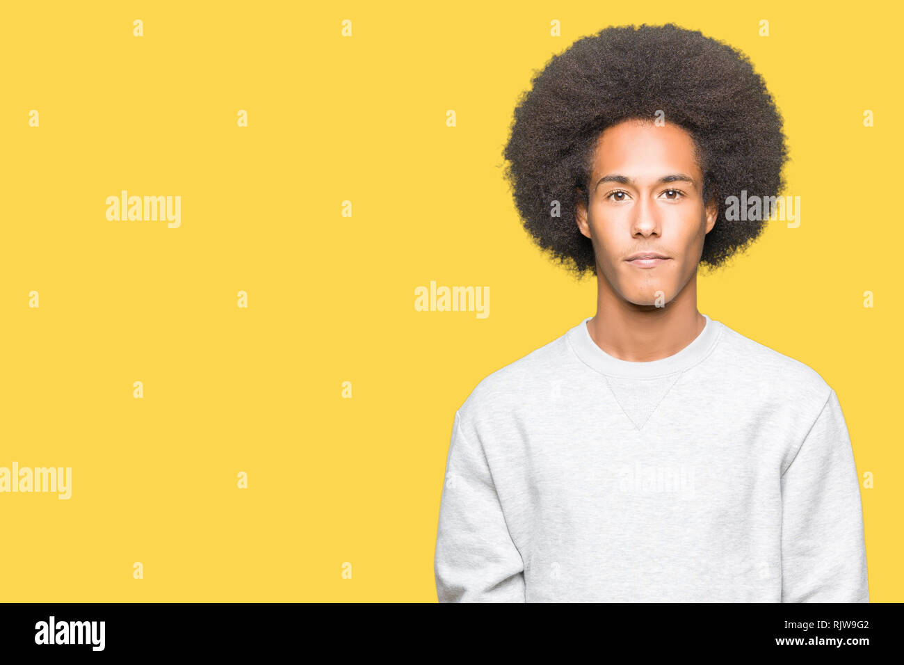 Young African American Man With Afro Hair Wearing Sporty