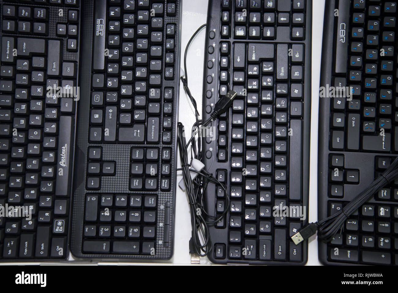 Chelyabinsk Region, Russia - February 2019. Black keyboard for a computer with a Russian font on the storefront Stock Photo