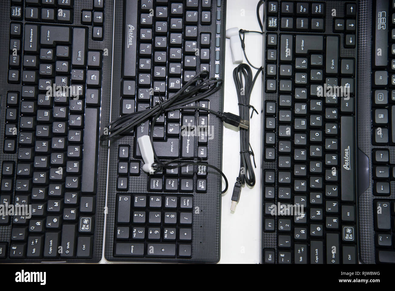 Chelyabinsk Region, Russia - February 2019. Black keyboard for a computer with a Russian font on the storefront Stock Photo