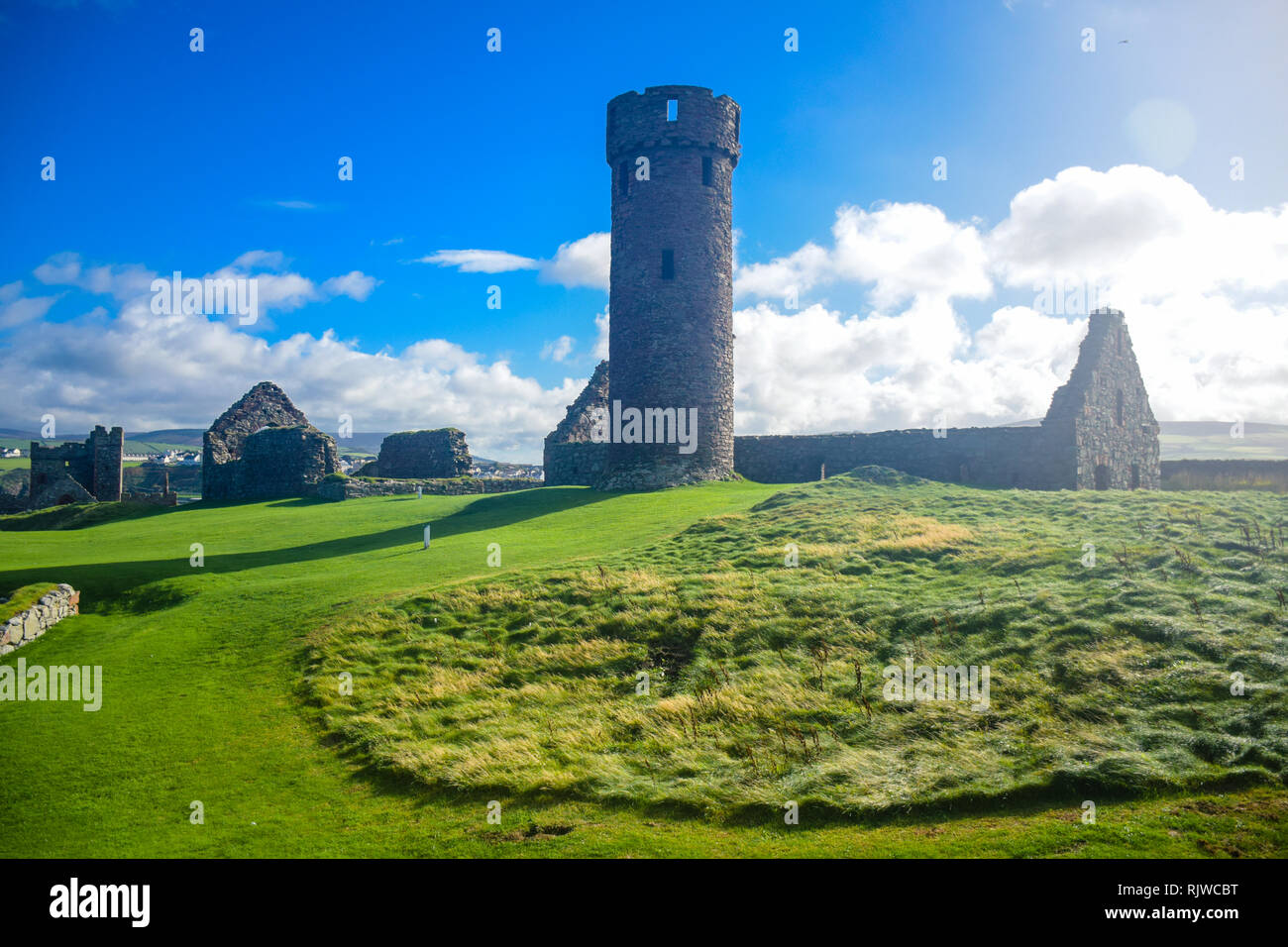 The remains of Peel Castle on St Patrick's Isle constructed by Vikings in Peel city in the Isle of Man Stock Photo