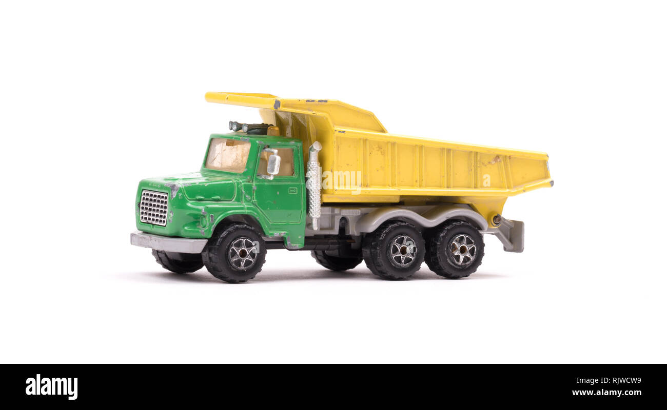 Dump truck toy isolated on white background Stock Photo - Alamy