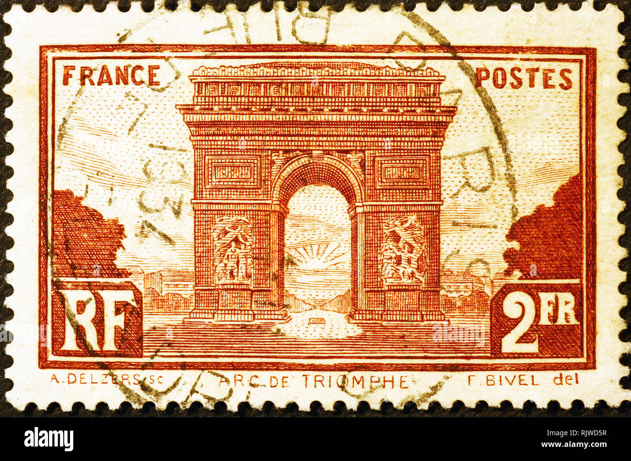 Arc de Triomphe of Paris on vintage postage stamp Stock Photo Alamy