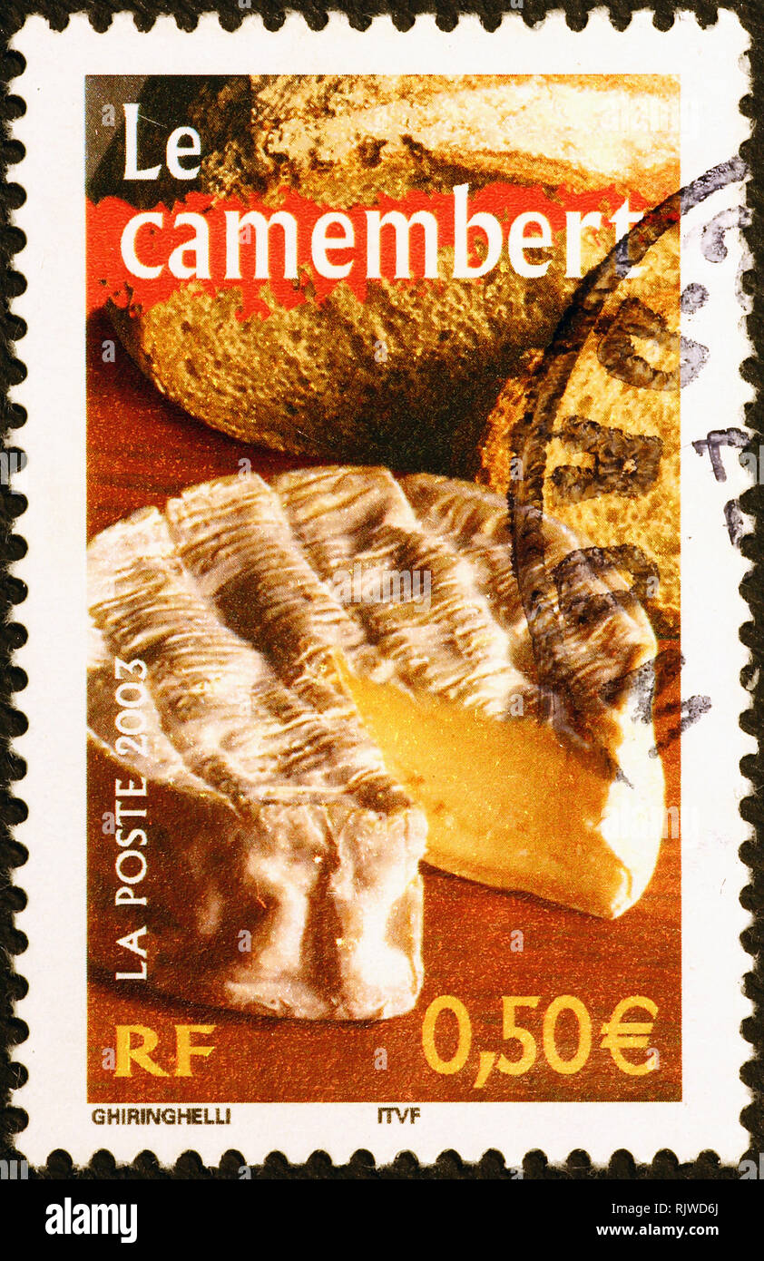 Camembert cheese on french postage stamp Stock Photo