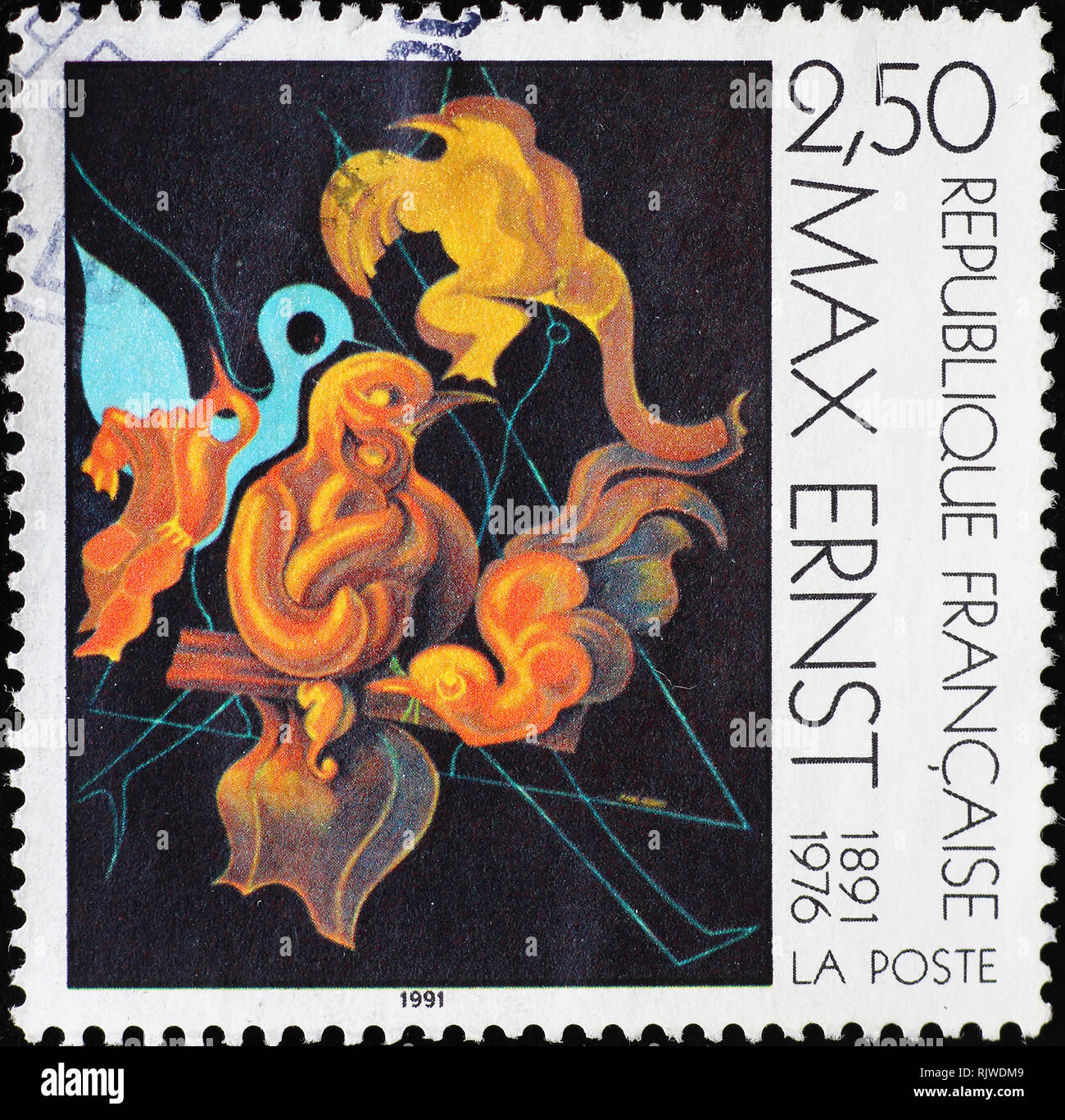 Painting by Max Ernst on postage stamp Stock Photo
