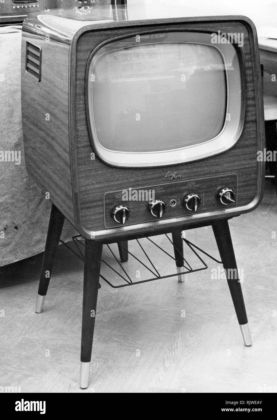 Television in the 1950s. A Luxor television set that was available for  customers 1957. A typical 1950s design with a wooden case standing on thin  legs Stock Photo - Alamy