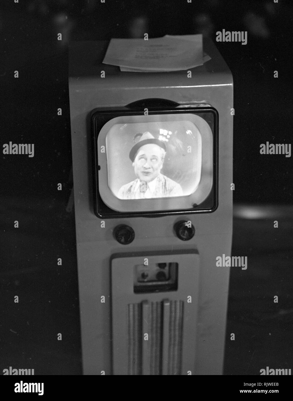 Television in the 1940s. Actor Max Hansen performing on televison 1948. A television broadcast prior national television and for viewing on only 15 tv recievers on the nearby department store NK. The British media company Pye Ltd, had already sucess with the new tv medum and was early one of BBC s suppliers of tv technology. Photo Kristoffersson ref 229a-2. Stock Photo
