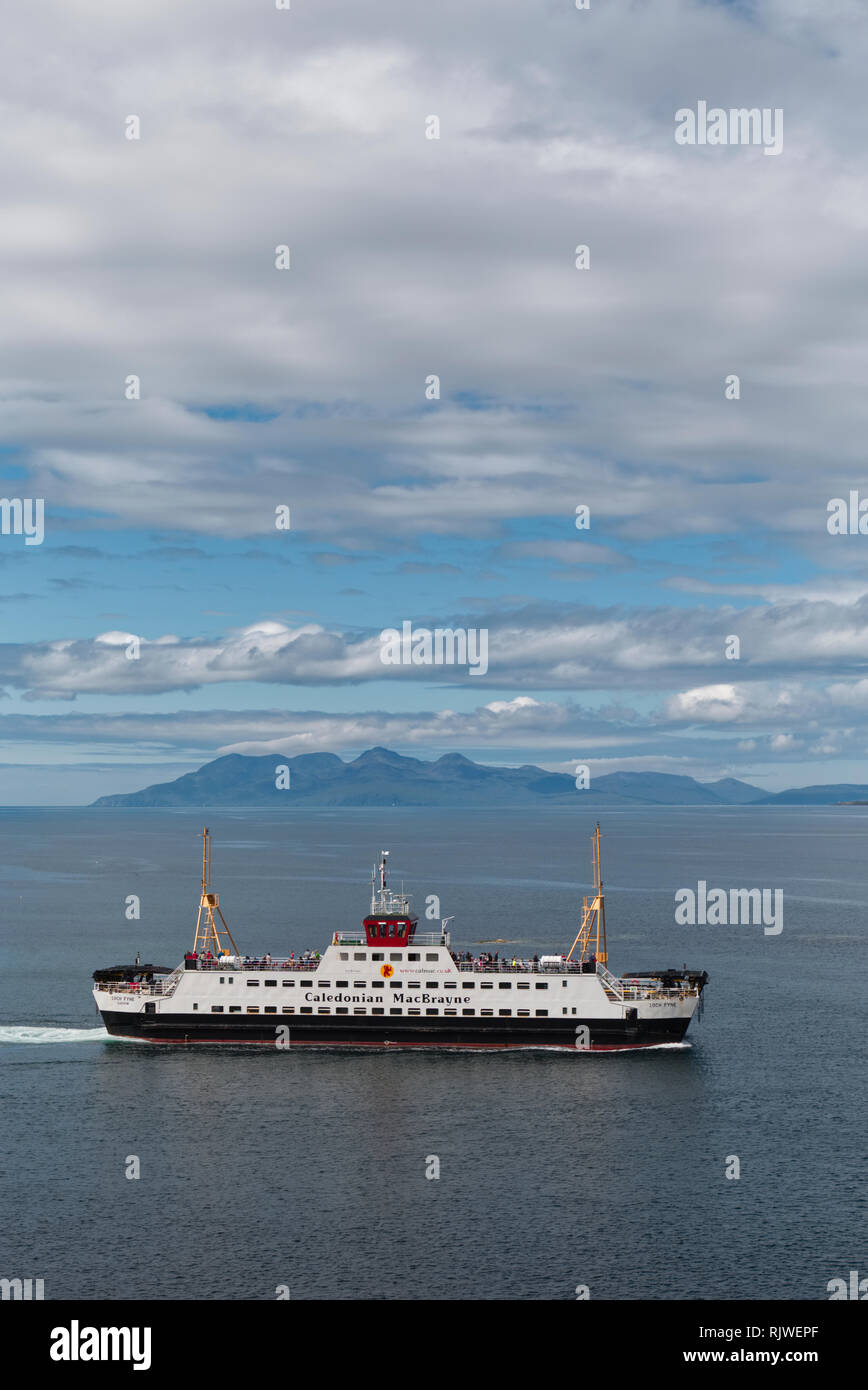 Caledonian MacBrayne ferry with Island of Rum behind Stock Photo Alamy