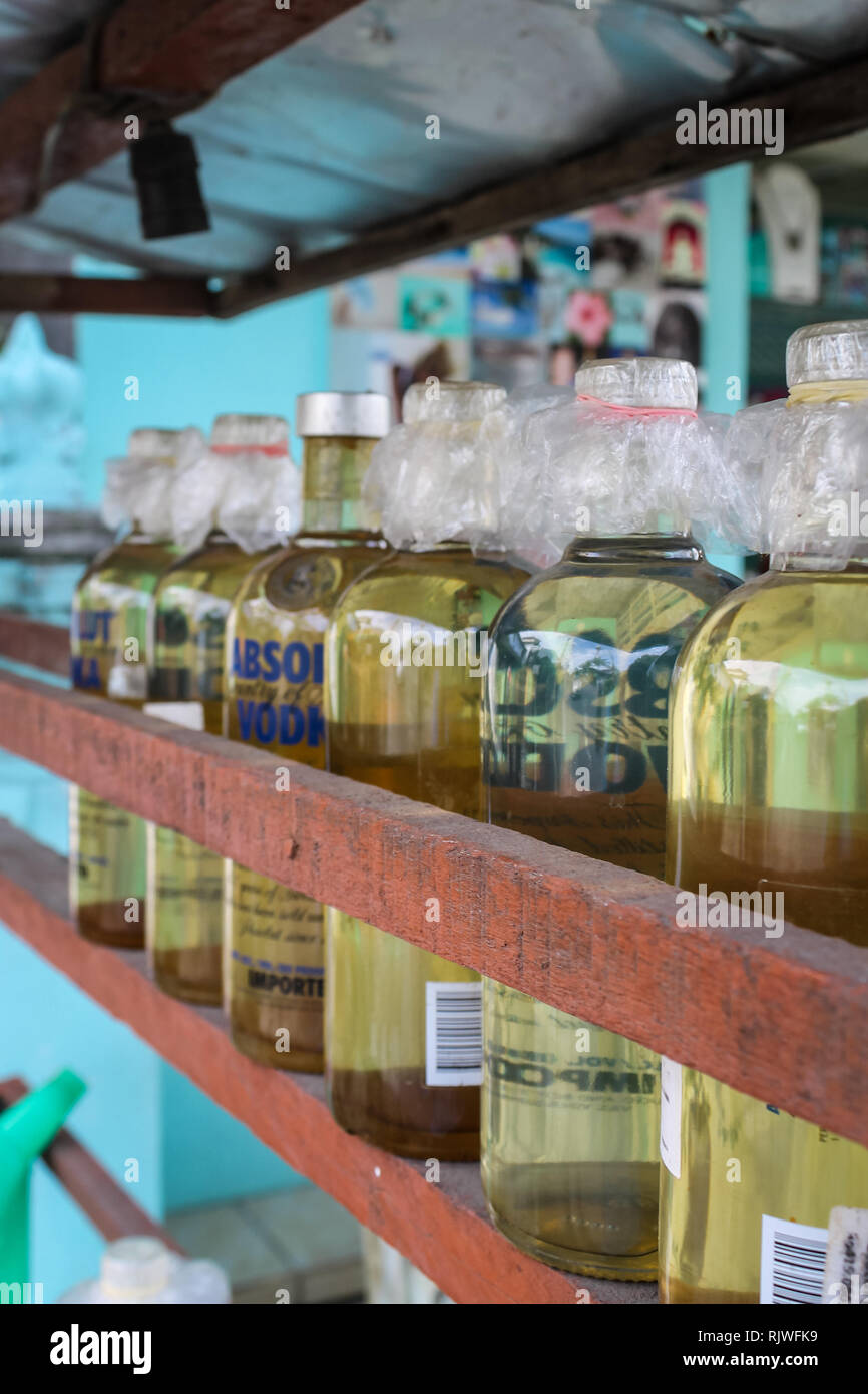 BALI, INDONESIA November 20, 2013 Illegal gasoline petrol is sold at