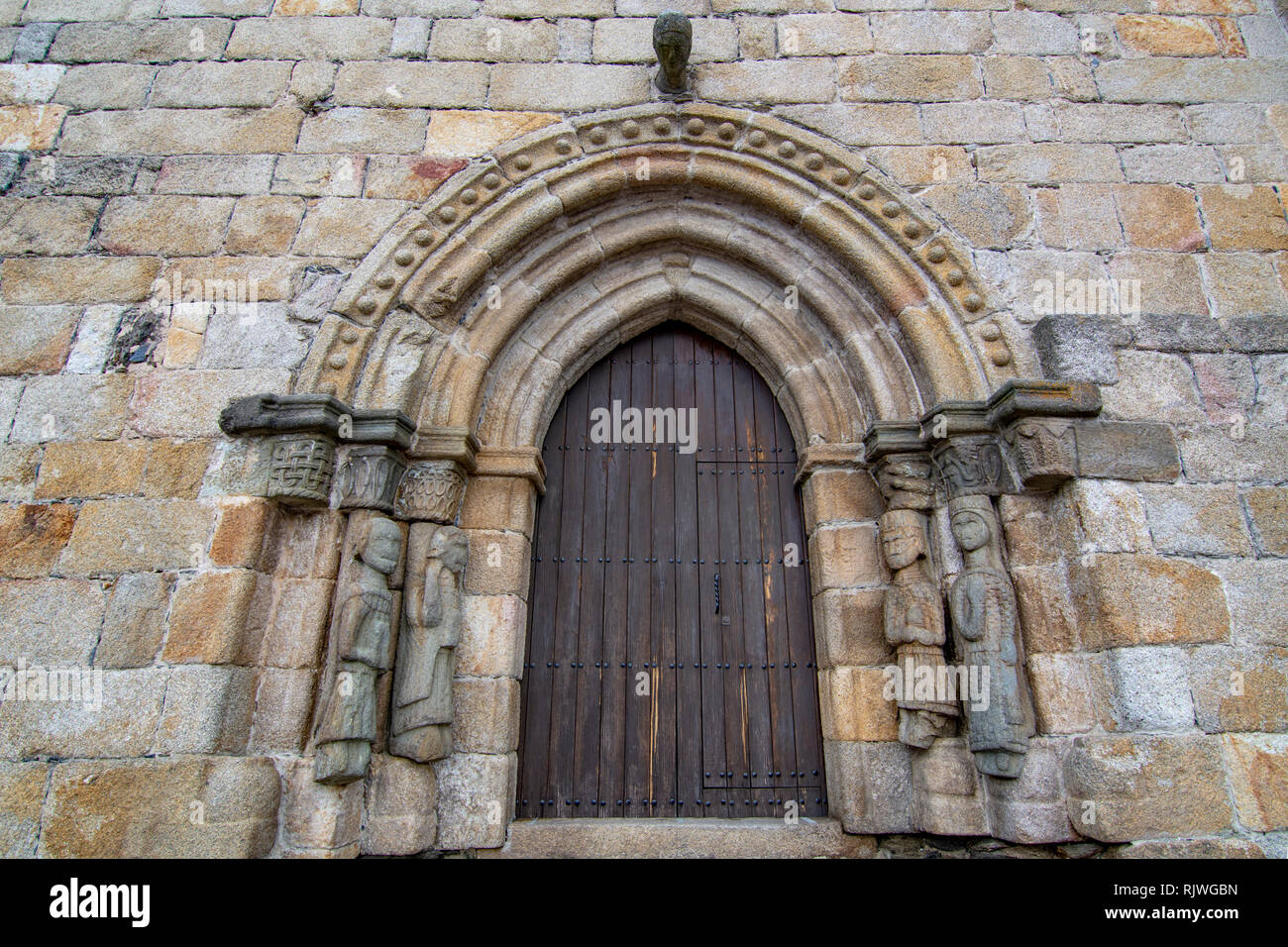Puebla de Sanabria, Zamora, Spain; January 2017: detail of the entrance door to the church of Puebla de Sanabria Stock Photo