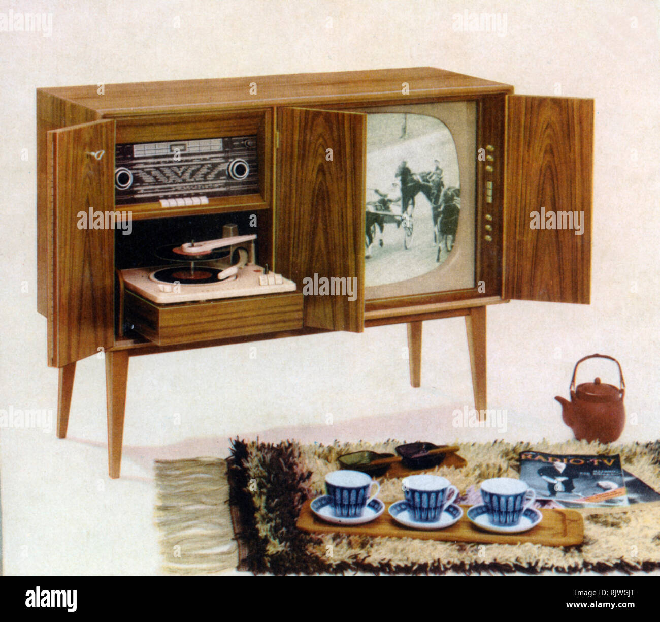 Television in the early 1960s. The swedish televison manufacturer Dux Radio and a commercial ad for their most exclusive model. A combined television, gramophone and radio in one unit a price of 2475 sek. Sweden 1960 Stock Photo