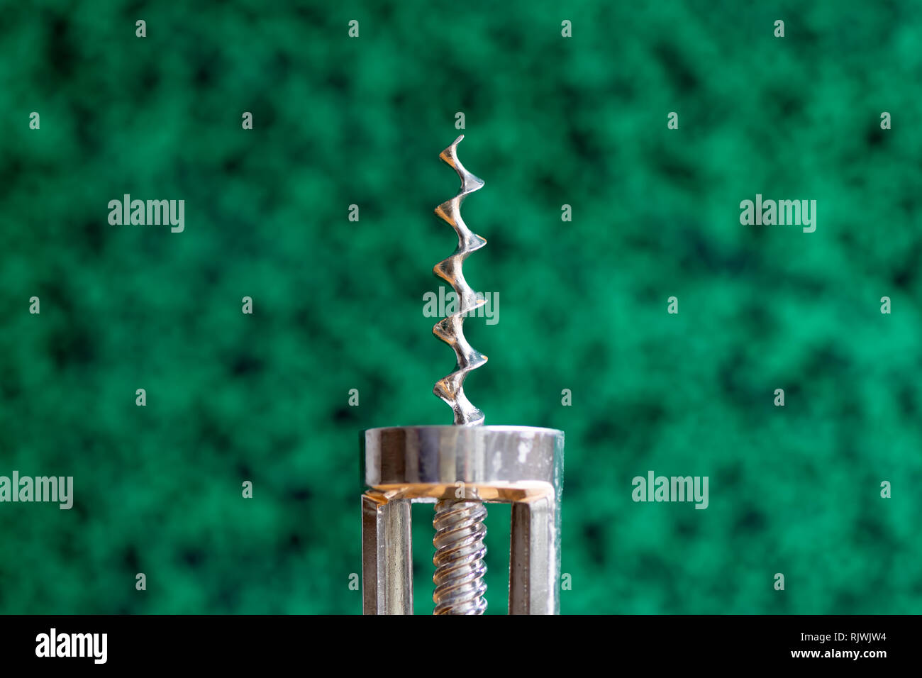 Old corkscrew on abstract background. Detail Stock Photo - Alamy
