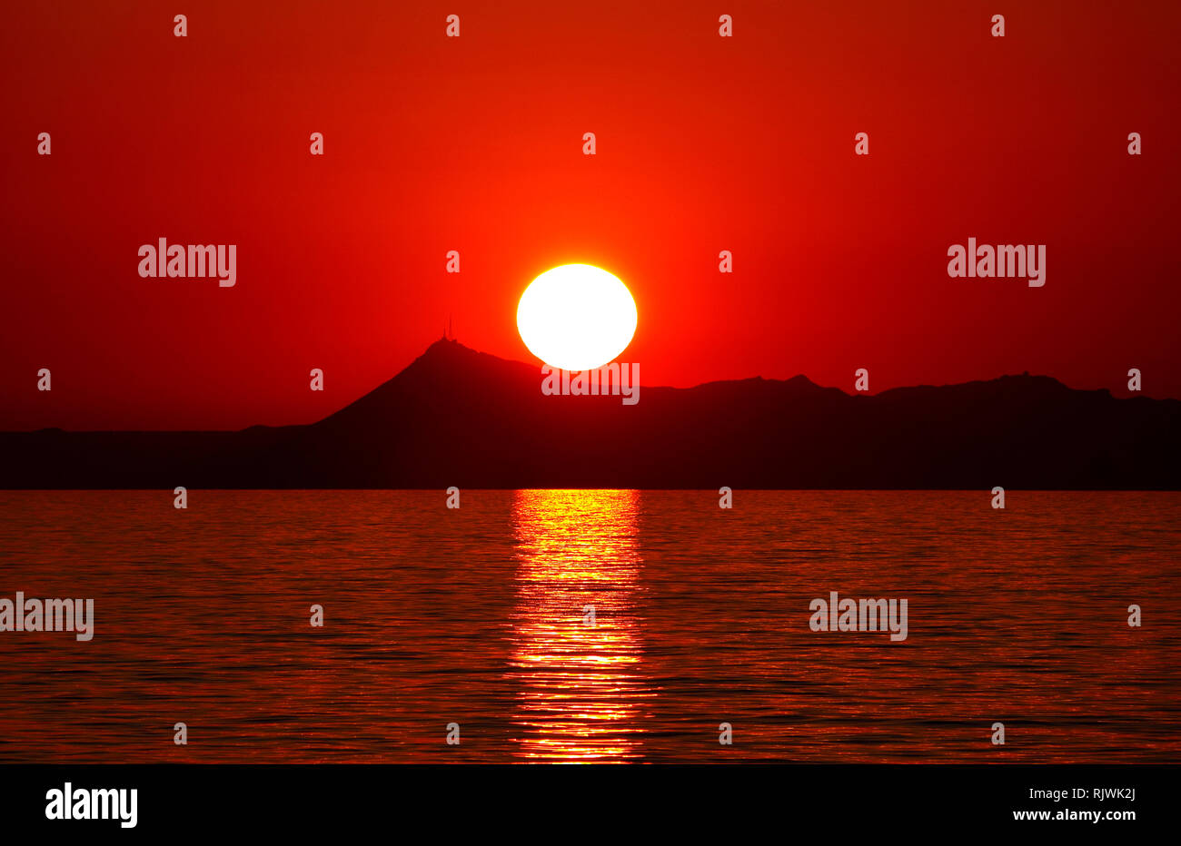 CRETAN SUNSET. CRETE GREEK ISLAND Stock Photo