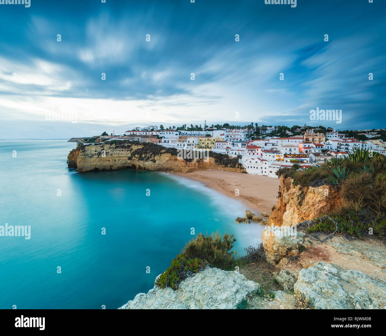 Rugged cliffs and village, high level view, Carvoeiro, Algarve, Portugal, Europe Stock Photo