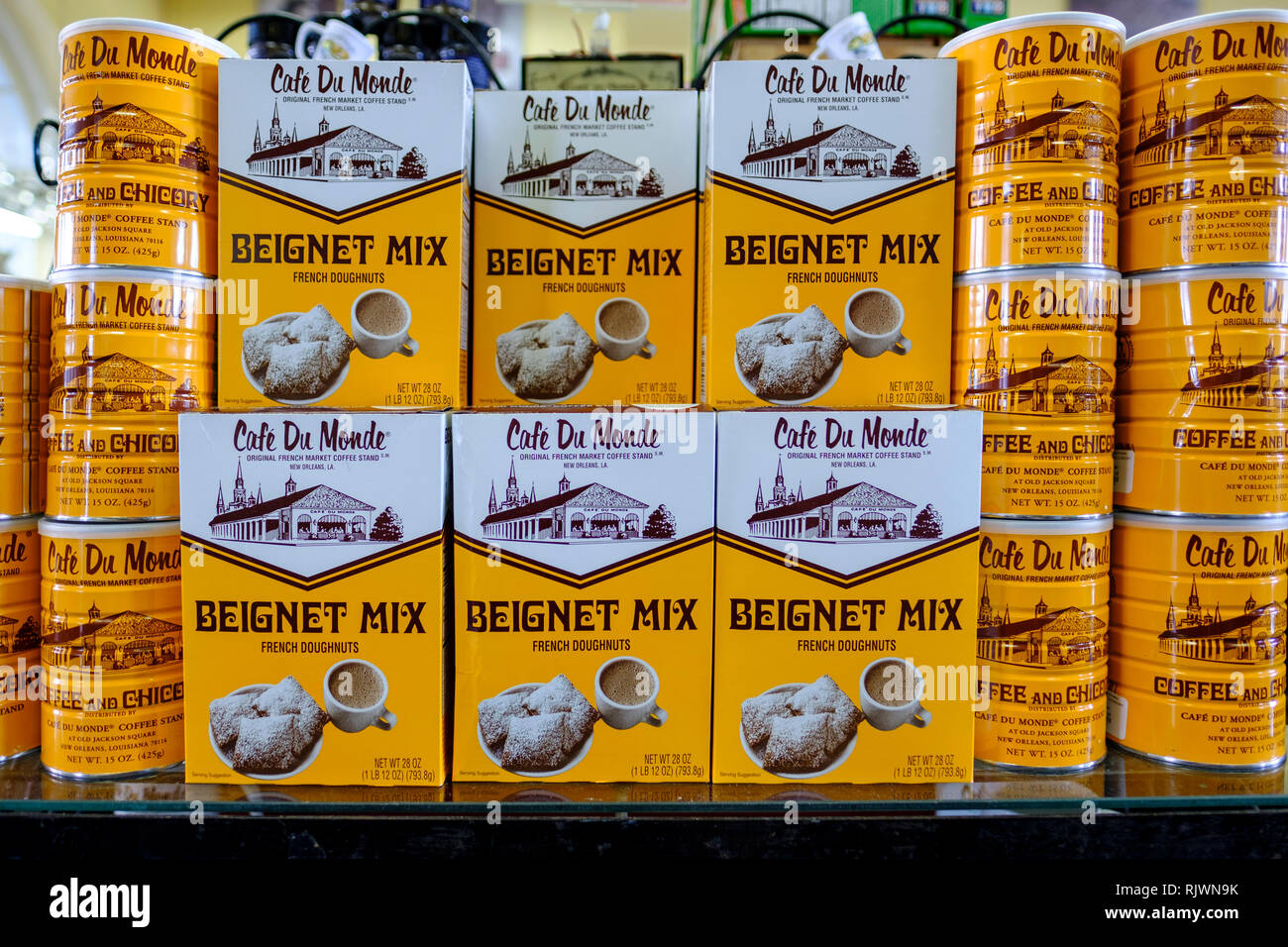 Retail store shelf with boxes and cans of Cafe Du Monde Beignet Mix French Doghnuts donuts, New Orleans French Quarter, New Orleans, Louisiana, USA. Stock Photo