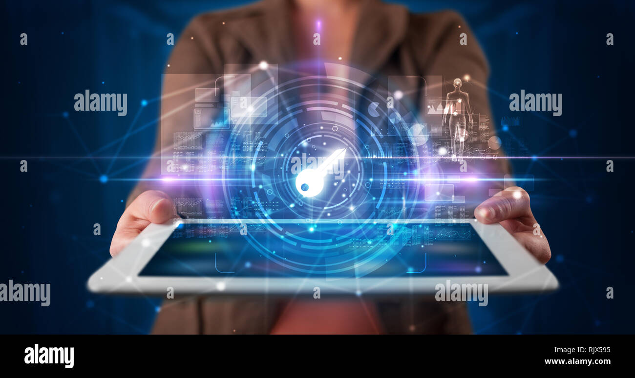 Hand holding tablet with online security and data protection concept ...