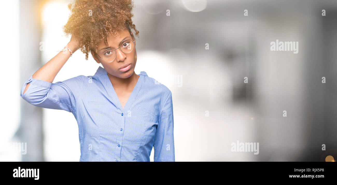 Beautiful young african american business woman over isolated ...
