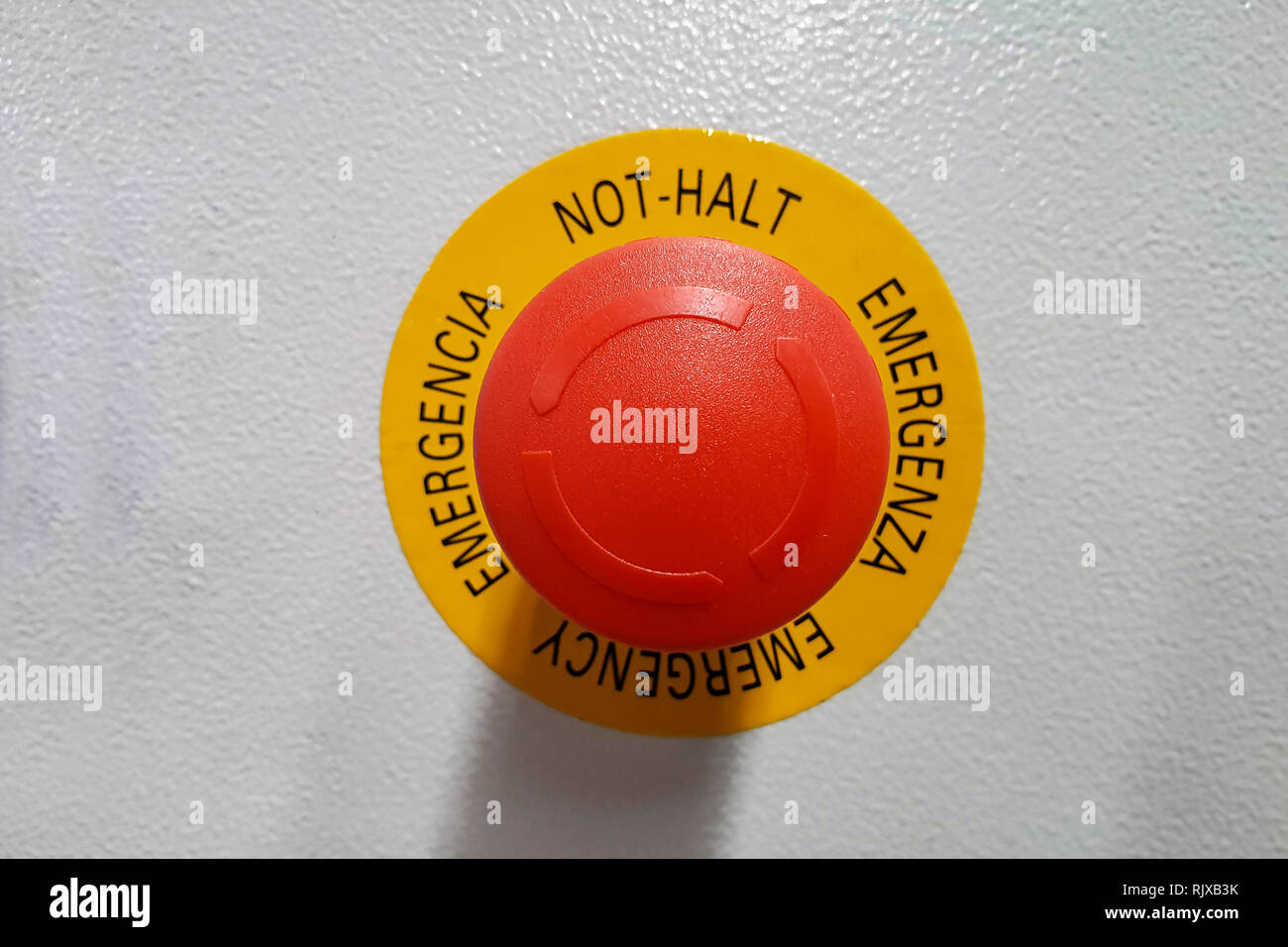 Red button / Text: Emergency stop Stock Photo