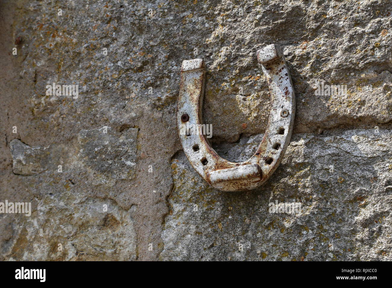 Horseshoe on the wall / Horseshoe on the wall Stock Photo Alamy