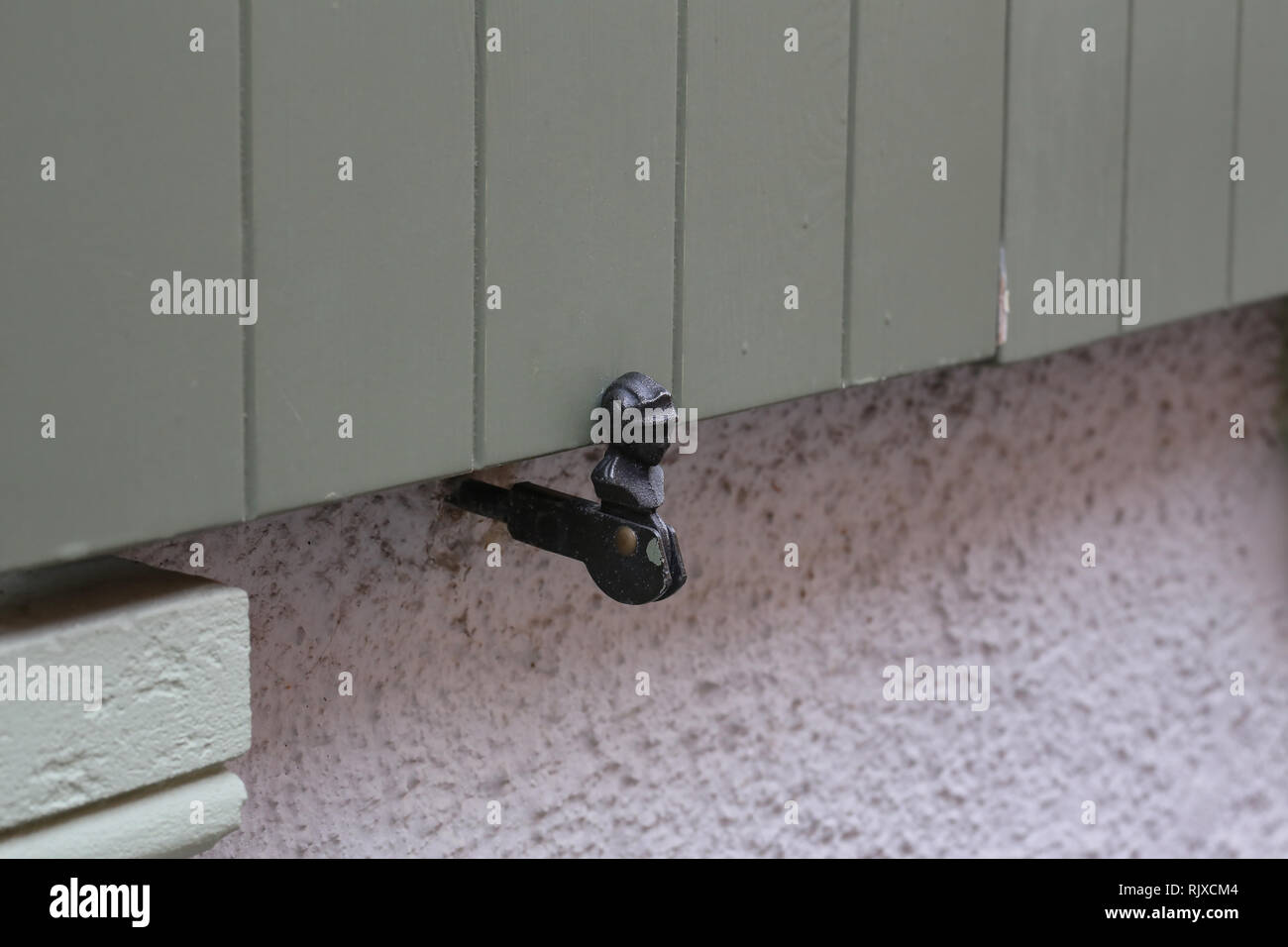 Antique metal window shutter holder in Germany Stock Photo Alamy