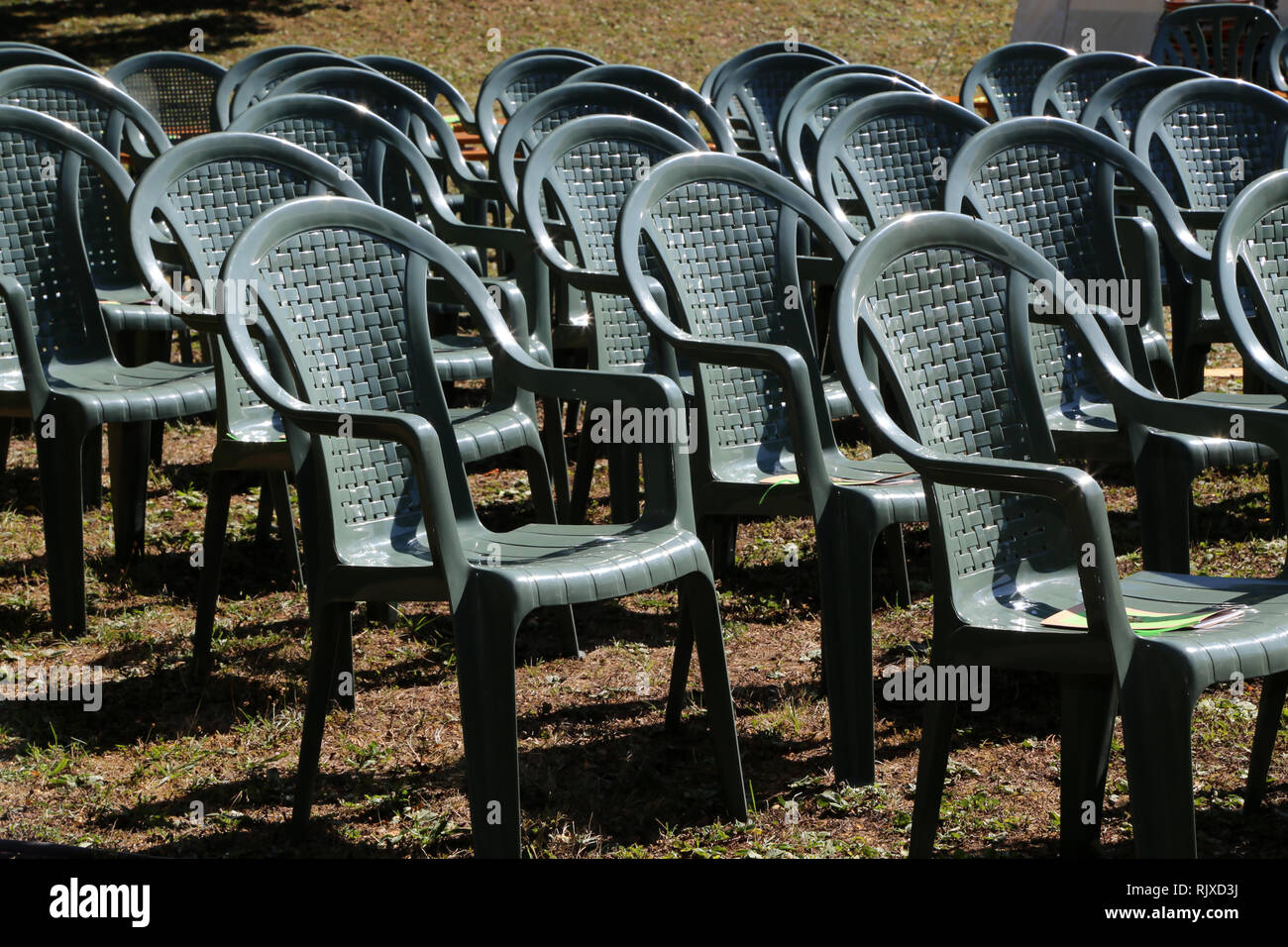 Chairs stand in rows Stock Photo