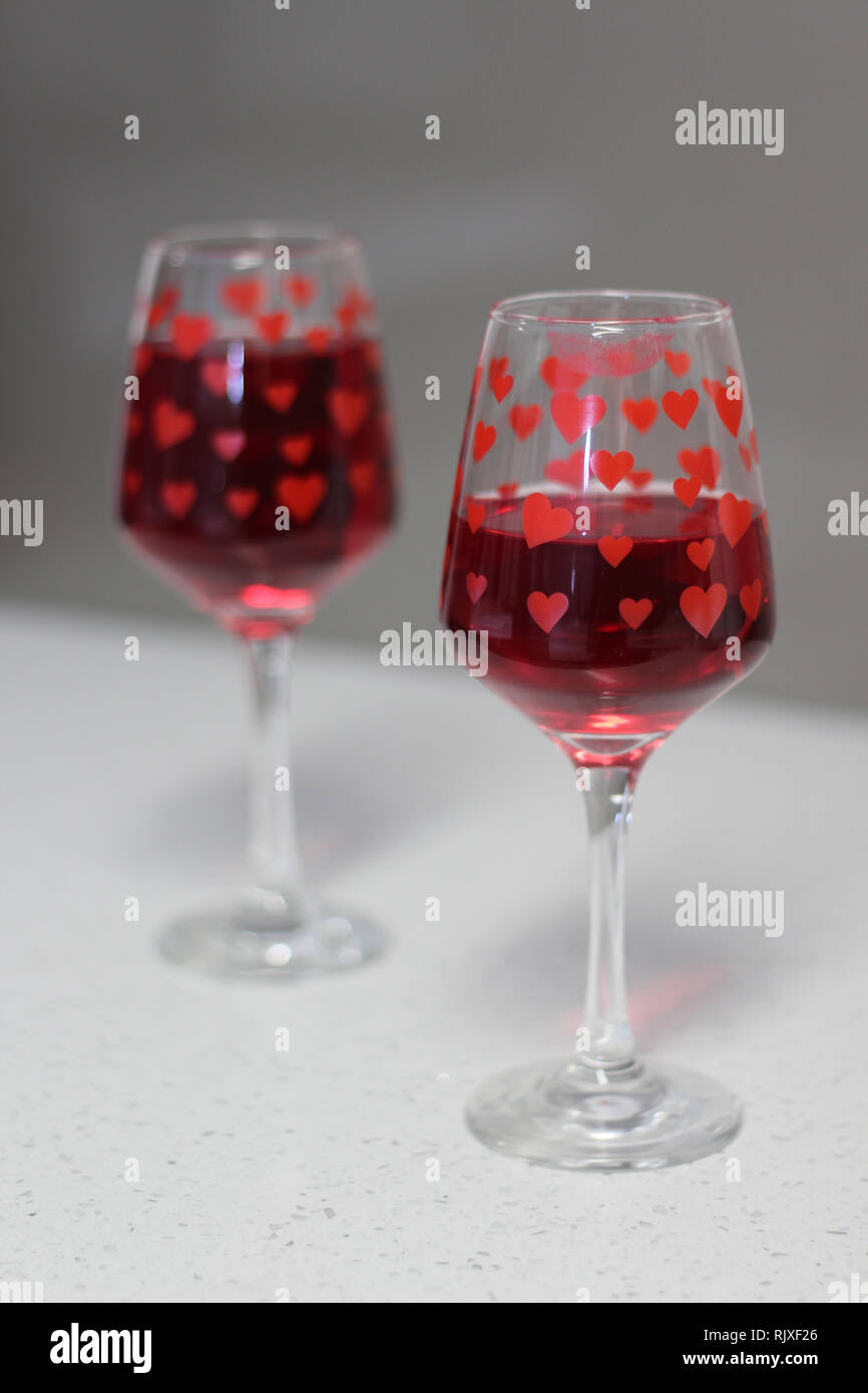 CARDIFF, WALES. 10th February 2017. wine glasses with lipstick stain on one to represent valentine's day Stock Photo