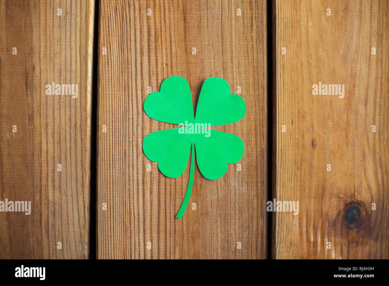 Green Paper Shamrock On Wooden Background Stock Photo 235382773