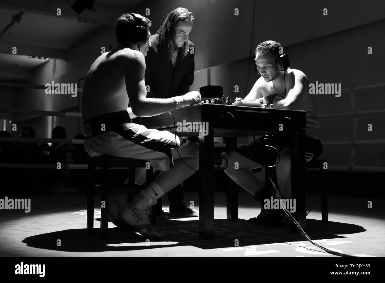 Chessboxing, boxing and chess board game being played alternately as part  of a new surreal sport, Islington, London, UK Stock Photo - Alamy