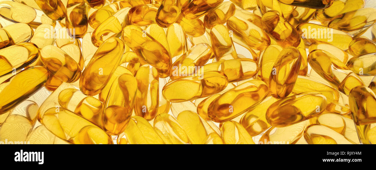 Transparent capsules illuminated from behind Stock Photo