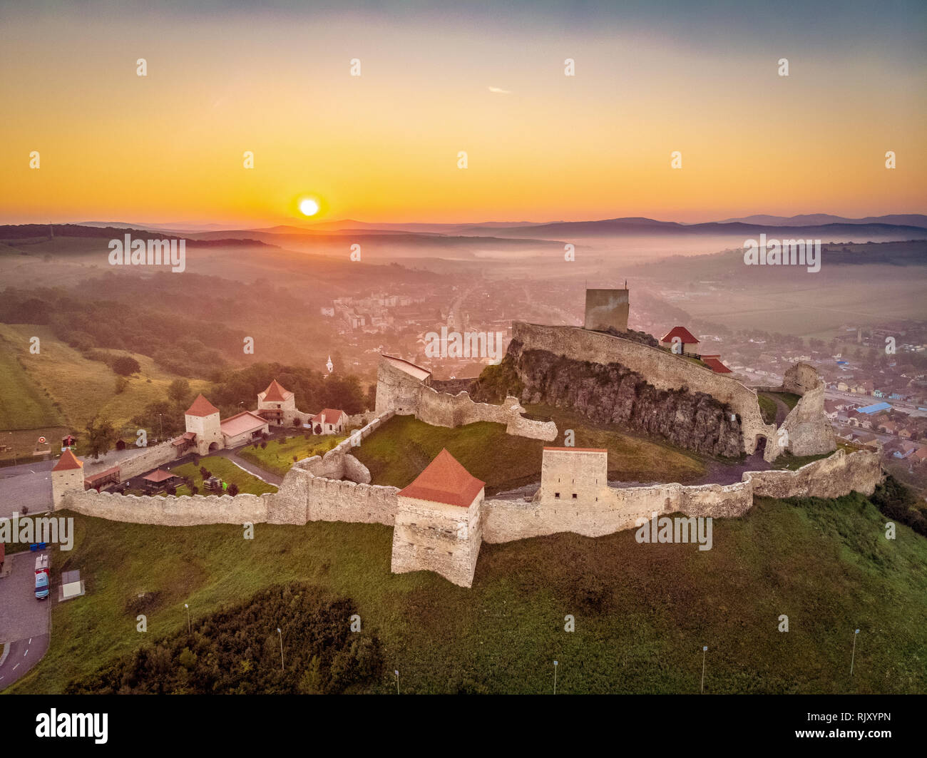Sunrise in Romania landscape at the Rupea Fortress in Transylvania between Brasov and Sighisoara Stock Photo
