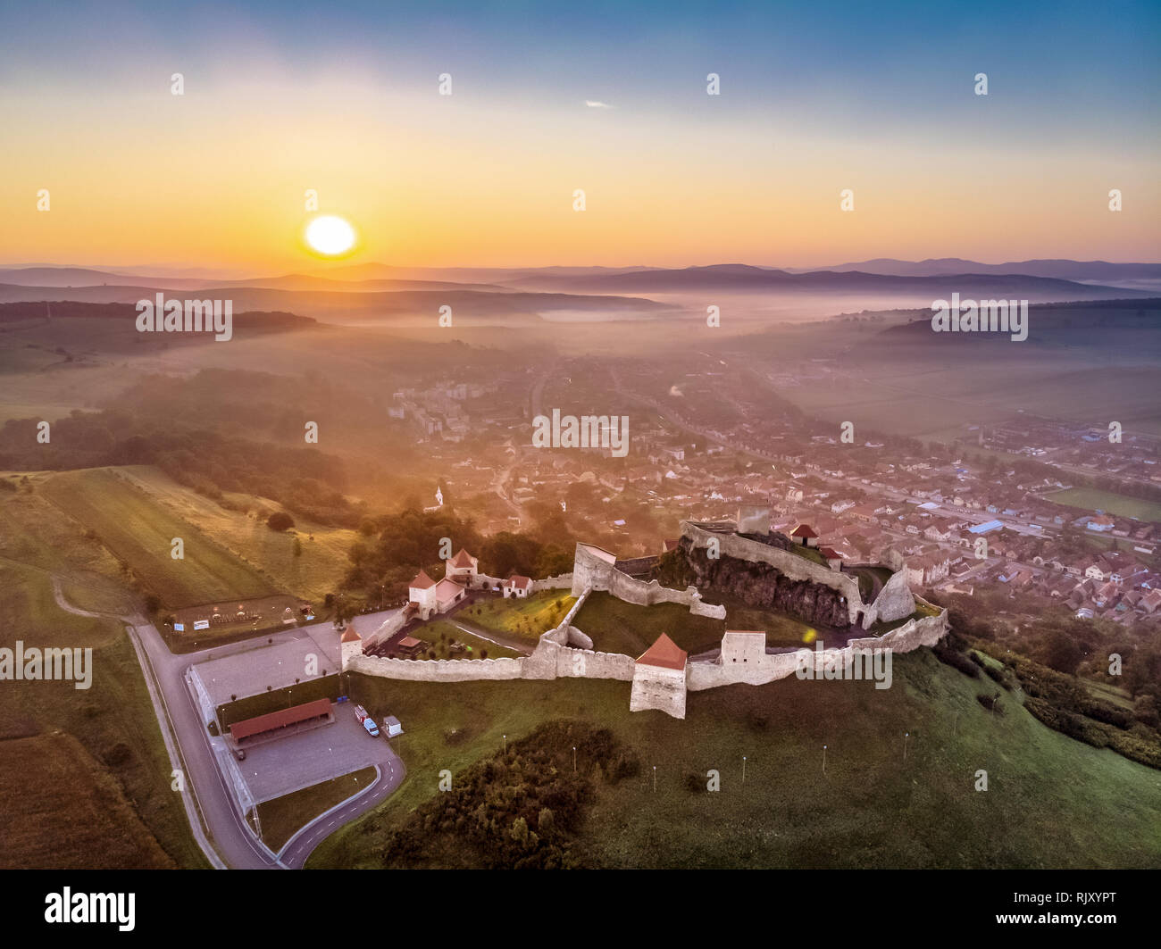 Sunrise in Romania at Fortress Rupea near Brasov and Sighisoara in Transylvania Stock Photo