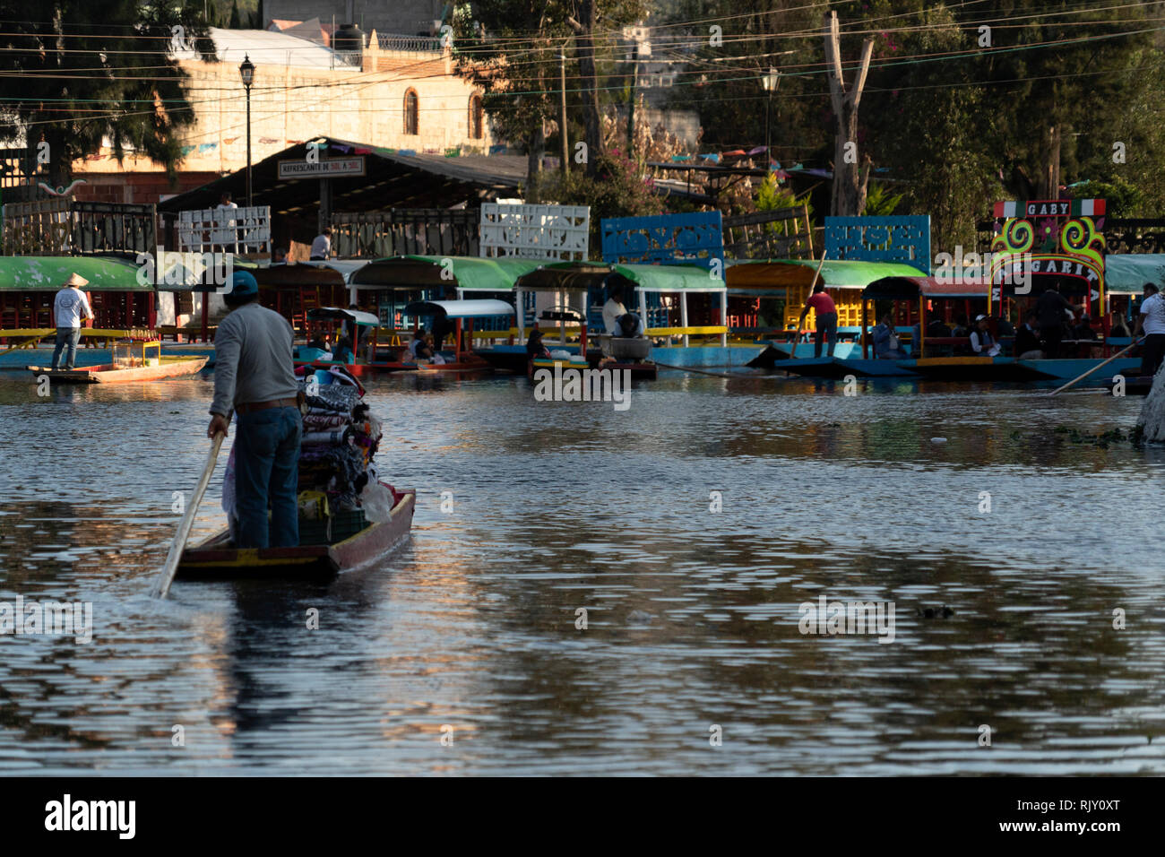 MEXICO CITY, MEXICO - JANUARY 30 2019 - Xochimilco the mexican little venice attract tourists and other city residents to ride on colorful gondola-lik Stock Photo