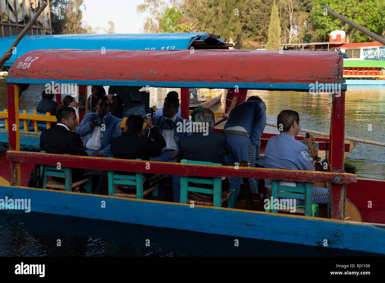MEXICO CITY, MEXICO - JANUARY 30 2019 - Xochimilco the mexican little venice attract tourists and other city residents to ride on colorful gondola-lik Stock Photo