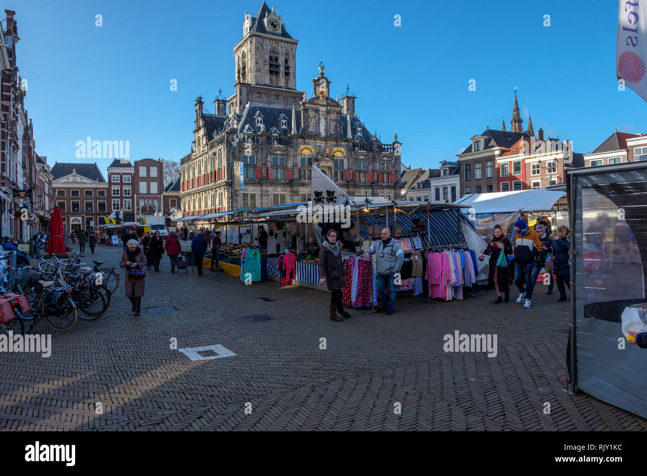 People shopping on the market at the Market square in the center of Delft, Netherlands Stock