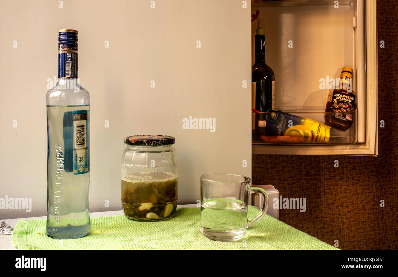 Vodka homemade, cucumbers, fridge Stock Photo