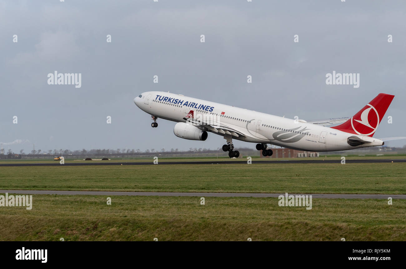 AMSTERDAM / NETHERLANDS - JAN 08, 2019: Turkish Airlines Airbus A330-343 TC-LOD passenger plane taking off from Amsterdam Schipol Airport Stock Photo