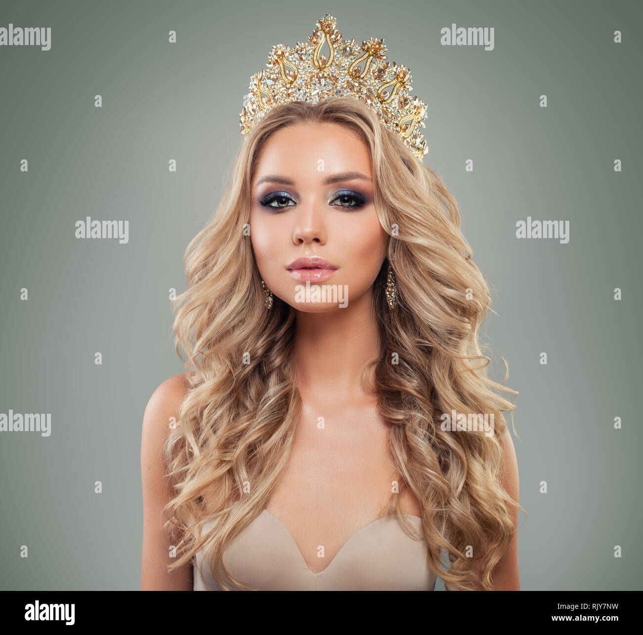 Blonde Woman With Makeup Long Curly Hairstyle Gold Jewelry Crown