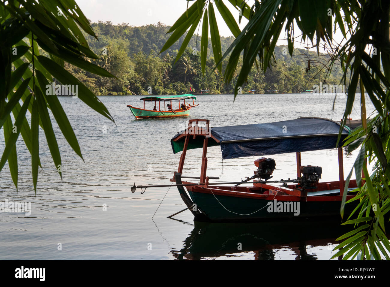 Cambodia, Koh Kong Province, Tatai River, boats on river at Rainbow Lodge resort Stock Photo