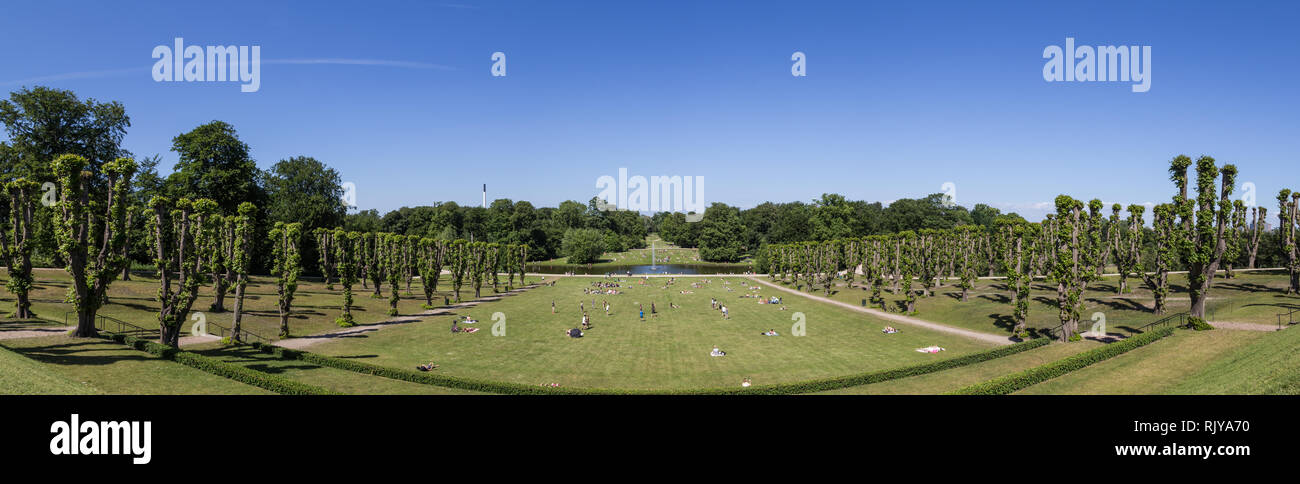 People enjoying the sun in Frederiksberg Park, Copenhagen Stock Photo